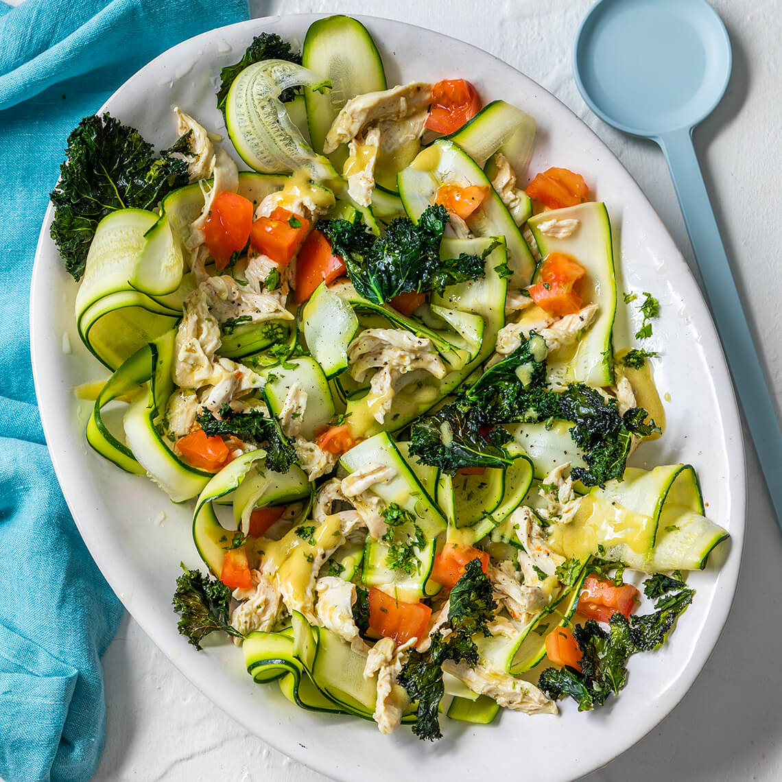 Poached chicken, baby marrow and kale salad